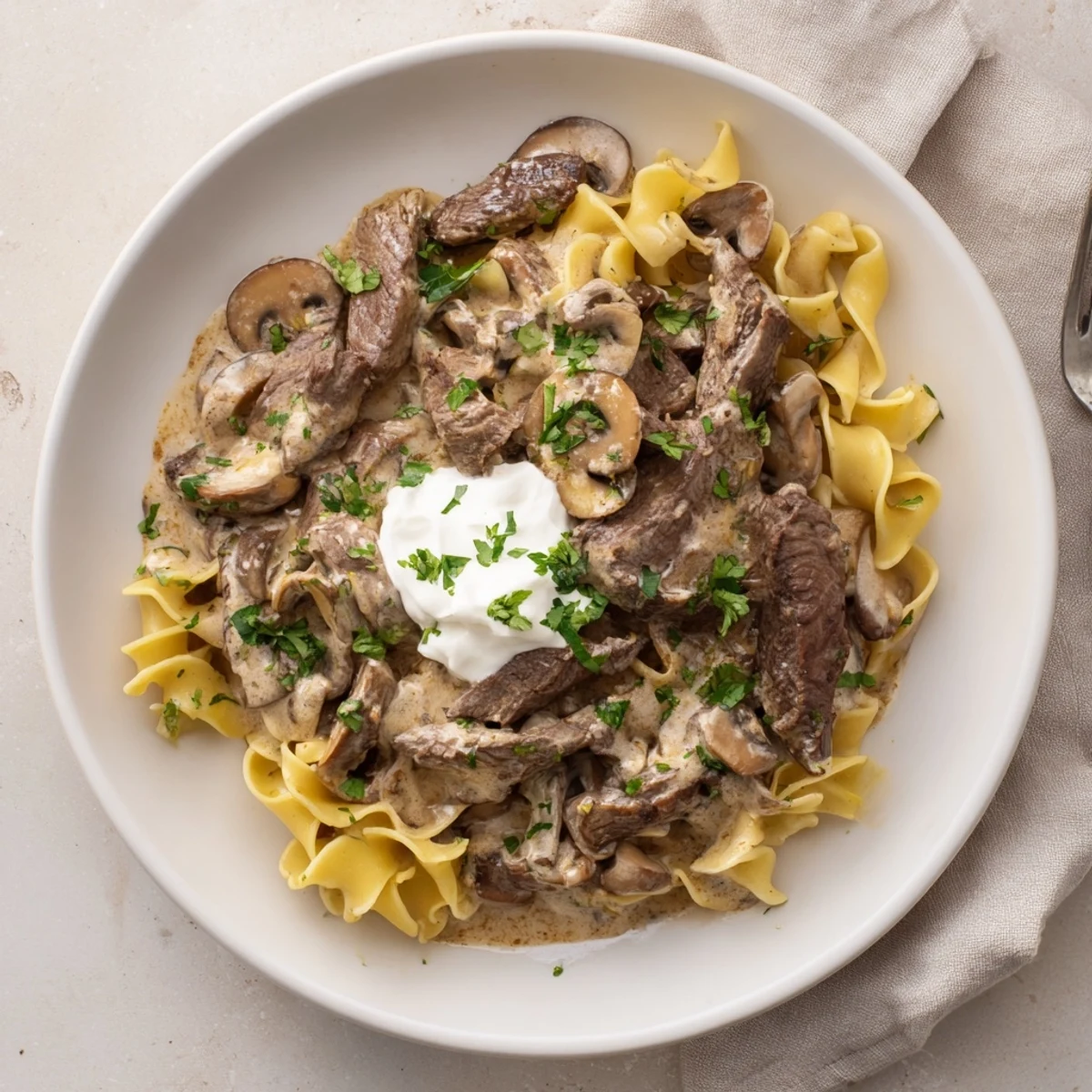 Creamy Beef and Mushroom Stroganoff with tender beef and rich mushroom sauce ready to serve.