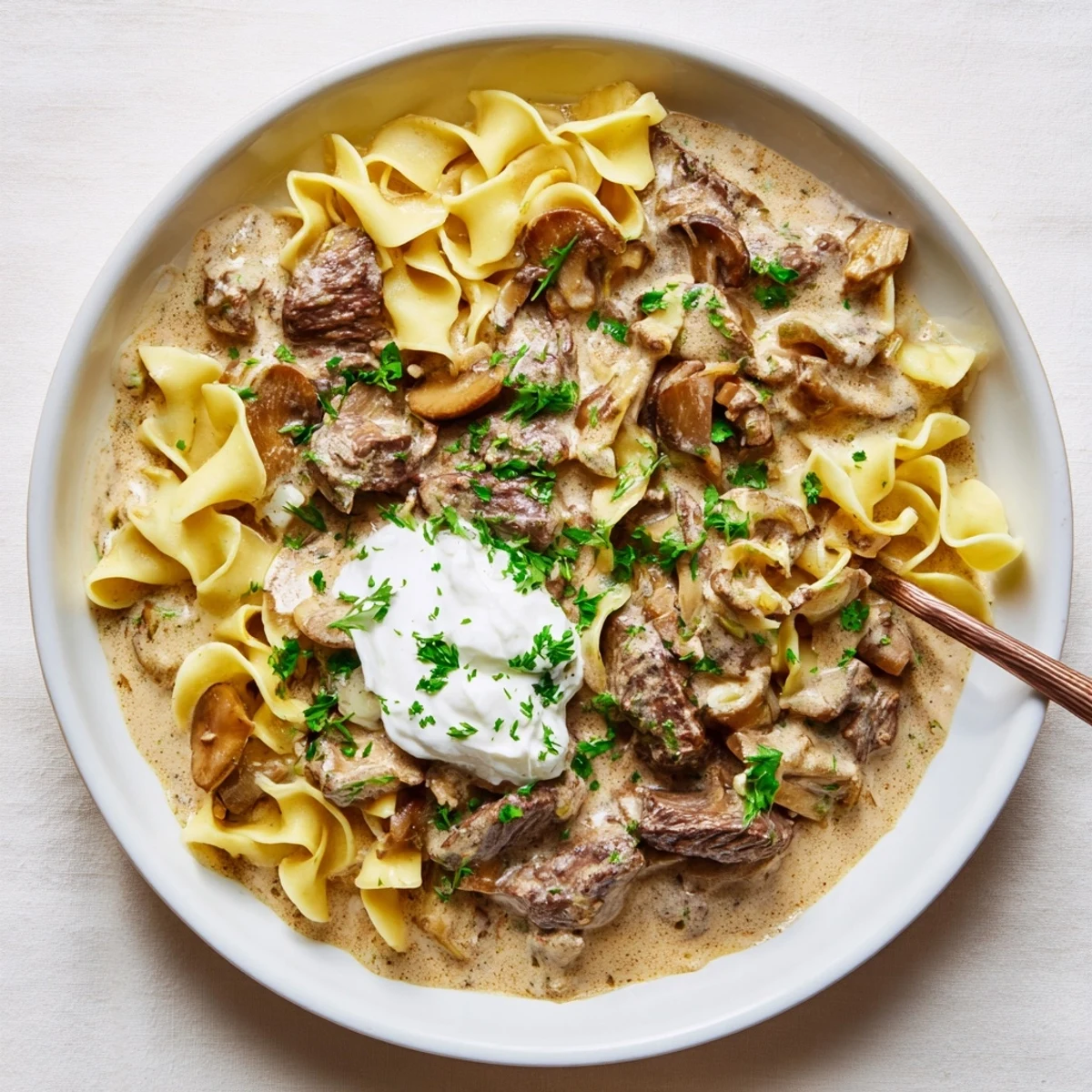 A close-up of Beef and Mushroom Stroganoff, showing the creamy texture and hearty ingredients.