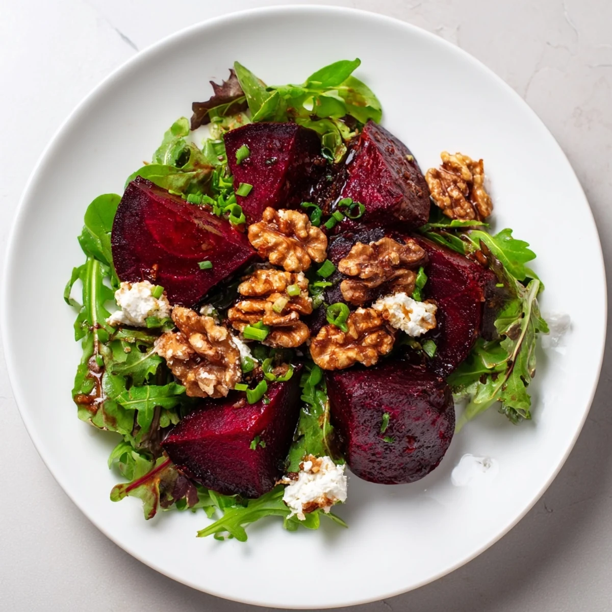 Vibrant Roasted Beet Salad with walnuts; a colorful, inviting salad ready to be enjoyed.