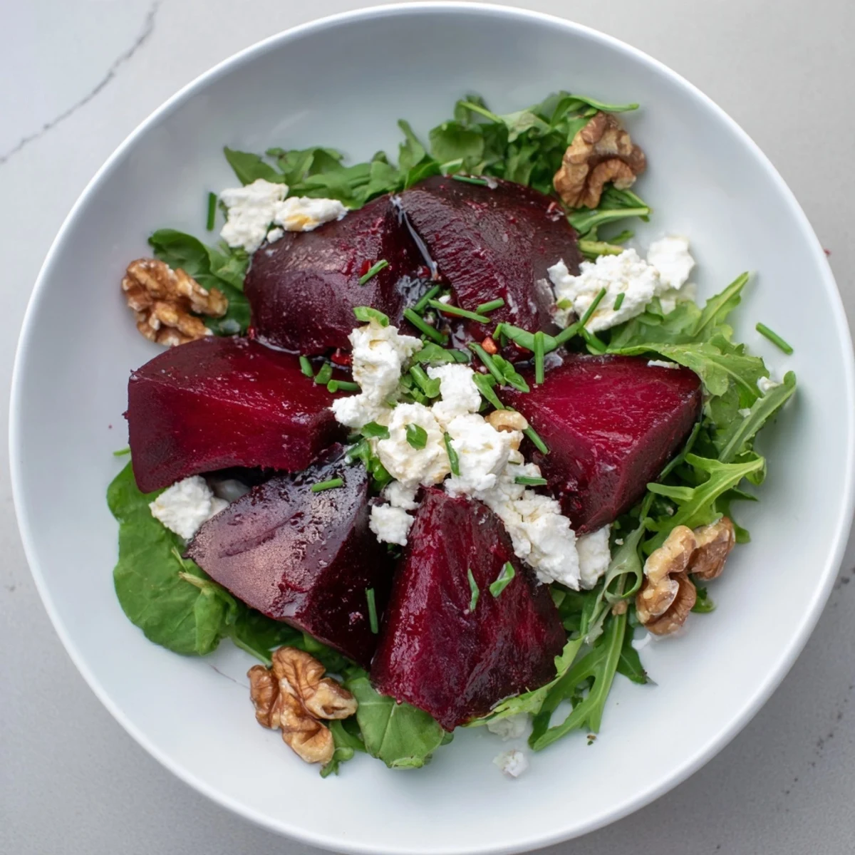 Sweet roasted beets star in this flavorful salad; a tempting dish ready to eat.