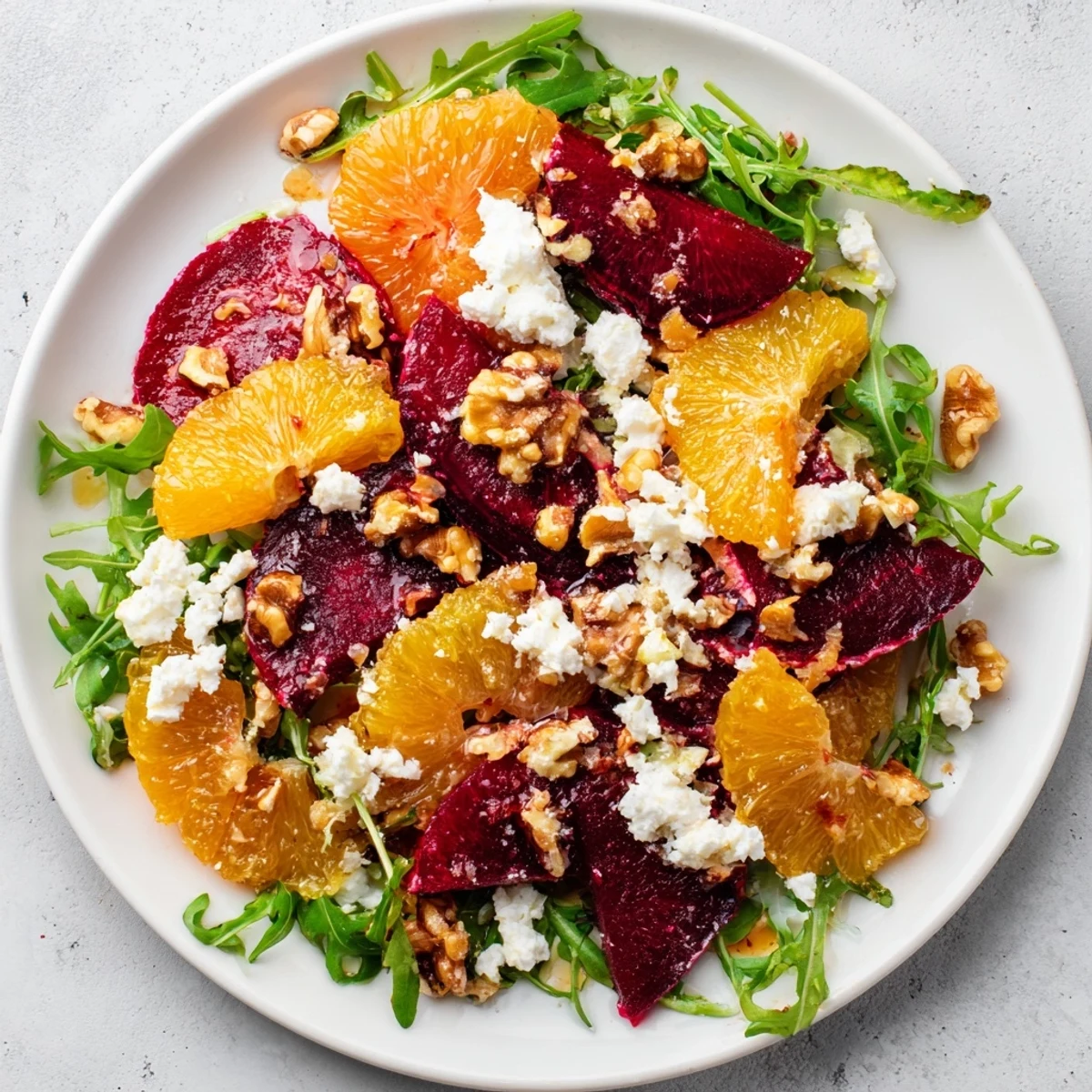 Golden roasted beets and juicy orange segments add sweetness to this Roasted Beet and Citrus Salad with Arugula.