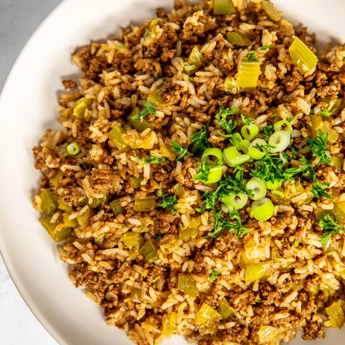 A hearty plate of Cajun Dirty Rice with Ground Beef, featuring tender grains and spiced beef, ideal for a weeknight dinner.