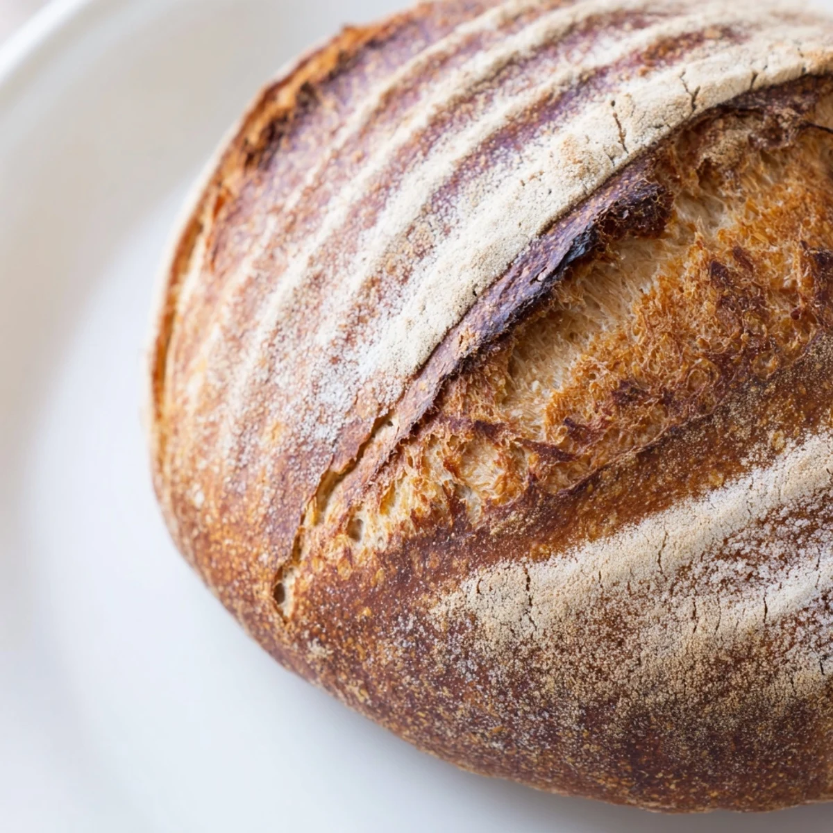 Homemade easy rustic bread cooling on wire rack ready to slice and serve warm