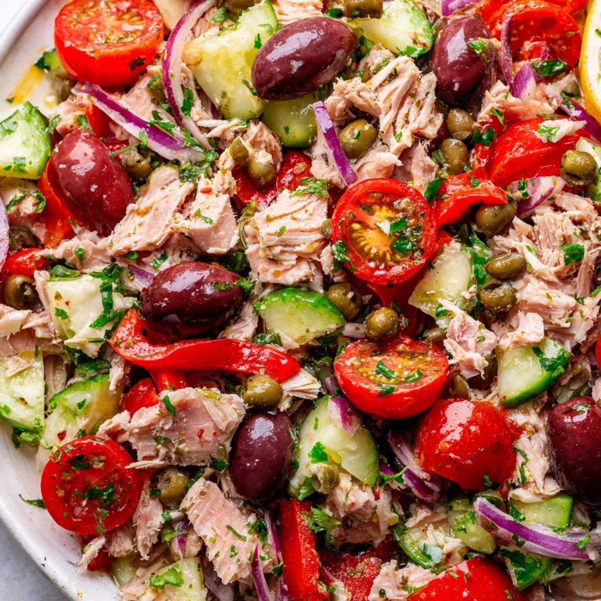 Crisp cucumber and red onion garnish this bright Mediterranean tuna salad with lemon dressing