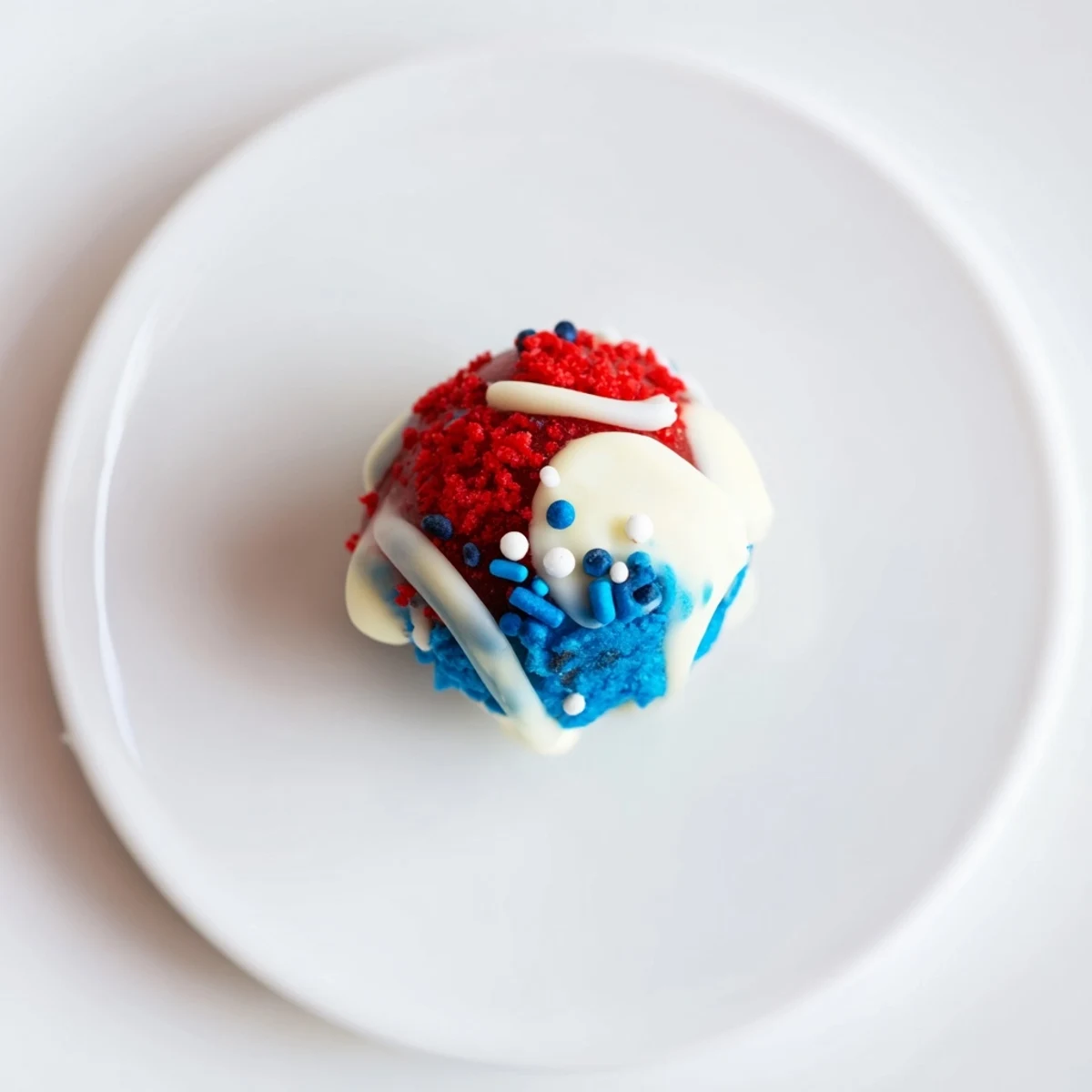 Bright berry-swirled Of July Truffles Creamy And Patriotic emitting sweet vanilla aroma