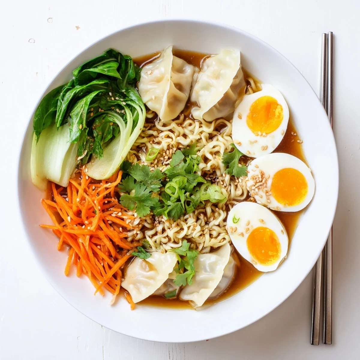 Golden soft-boiled eggs crown this comforting dumpling ramen bowl with napa cabbage and carrots