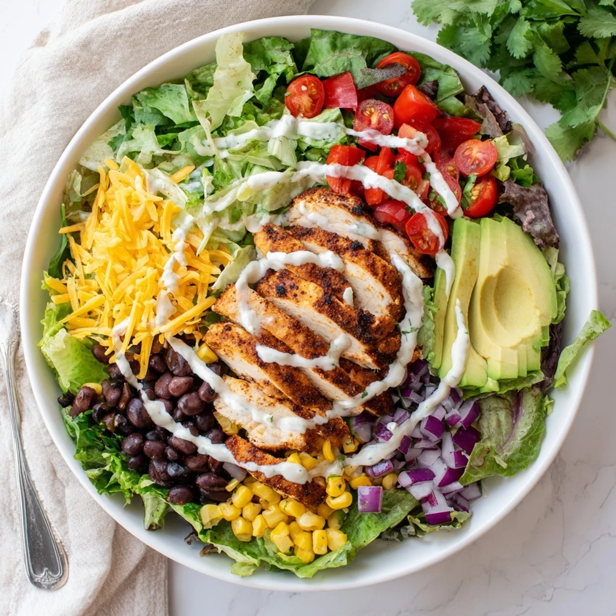 Southwestern Chicken Salad with grilled sliced chicken, roasted corn, creamy lime dressing