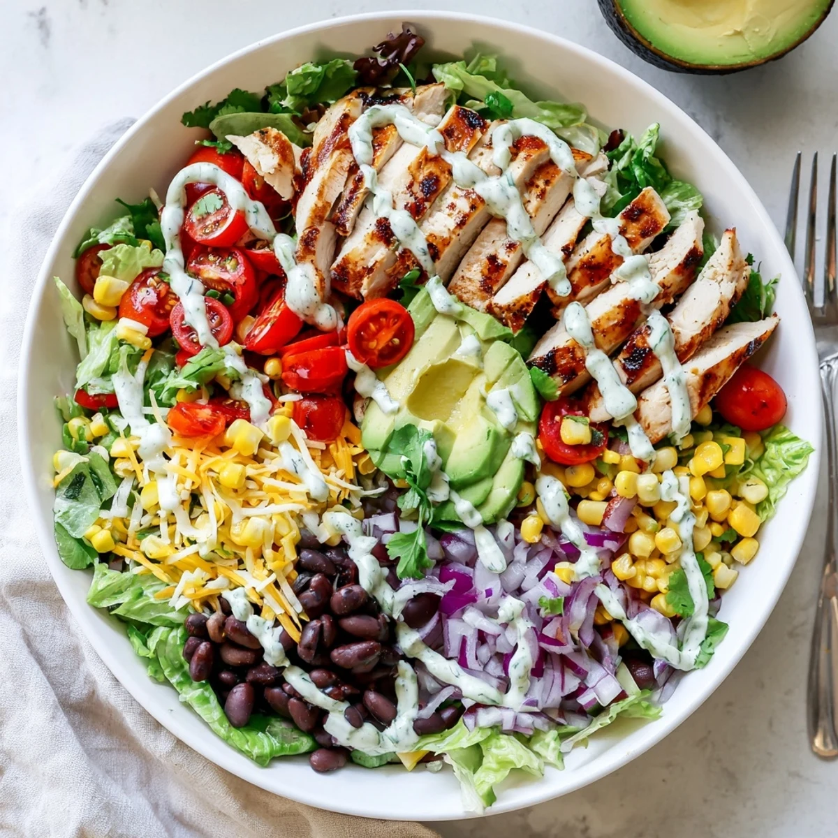 Smoky Southwestern Chicken Salad served chilled with tortilla strips and pepperjack