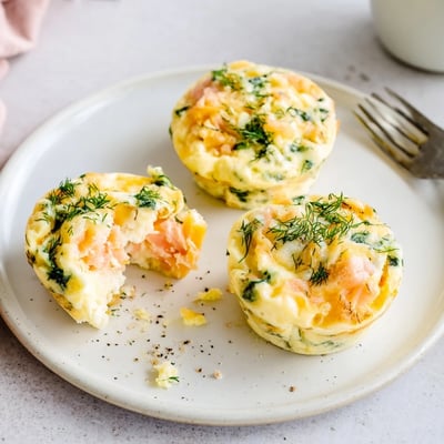 Smoked Salmon Egg Muffins, bite-size and cheesy, folded with fresh dill